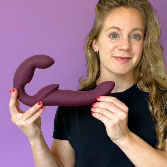 Gabrielle Kassel holding a Sharevibe Pro double dildo from Fun Factory