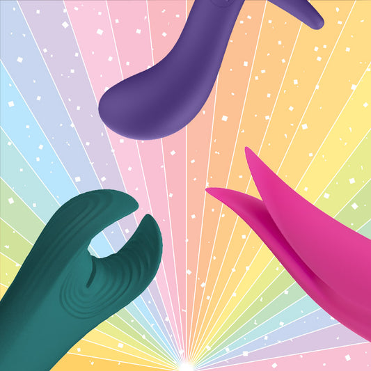 Manta Bootie and Volta on a graphic background of pastel rainbow with sparkles.
