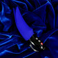 Sapphire VOLTA clit toy on blue velvet