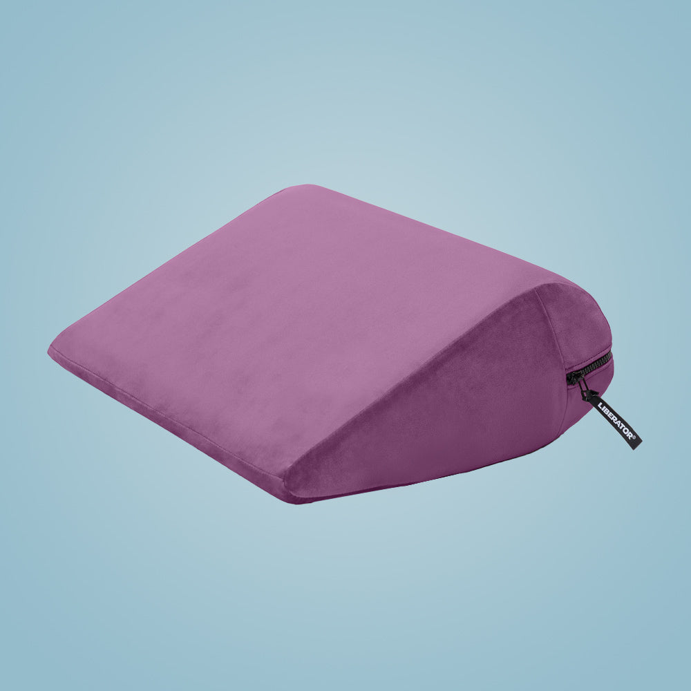 Liberator Jaz sex pillow small travel violet front view on blue background