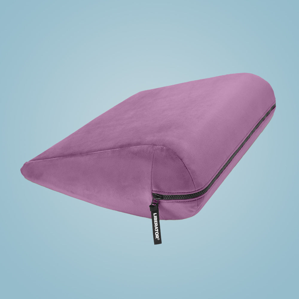 Jaz Pillow by Liberator purple with zipper on blue background