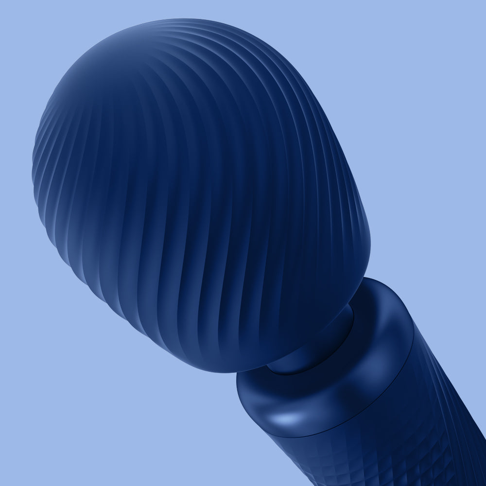 Wand Vibratory by Fun Factory in blue with a focus on the head on a blue background
