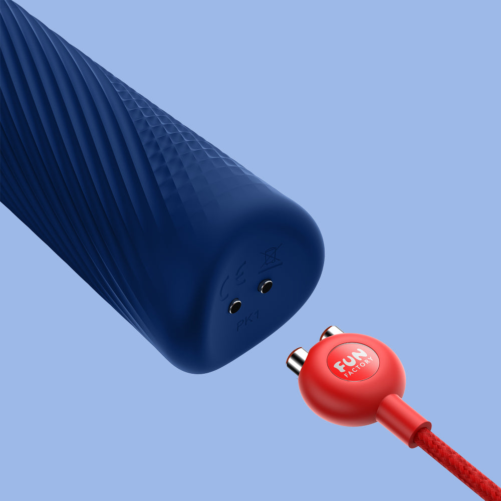 Wand Vibratory by Fun Factory in blue showcasing the charger slot on a blue background